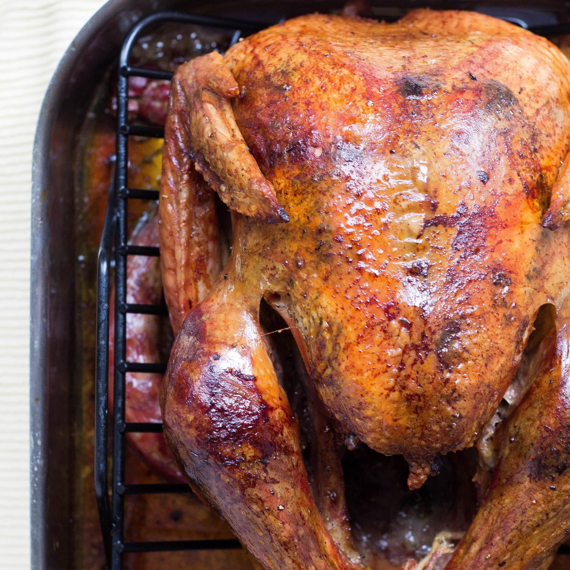 Roasted chicken in roasting pan